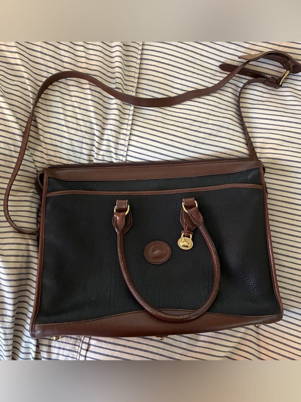 Dooney & Bourke Black Leather Satchel with Brown Trim and Gold Hardware